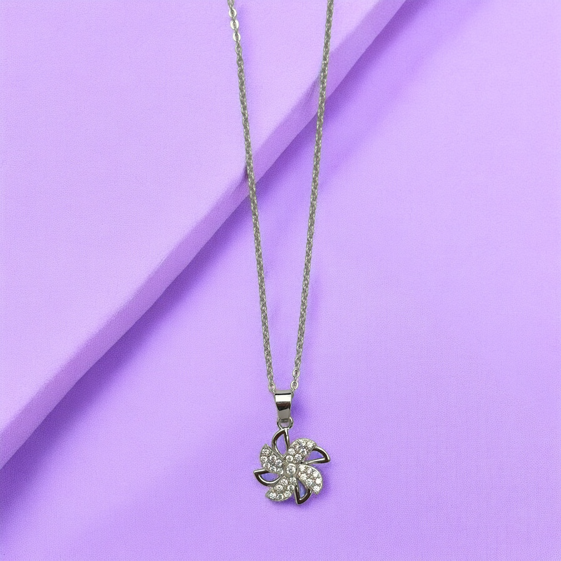 Twirl Bloom Necklace – Rotating Crystal Flower Pendant