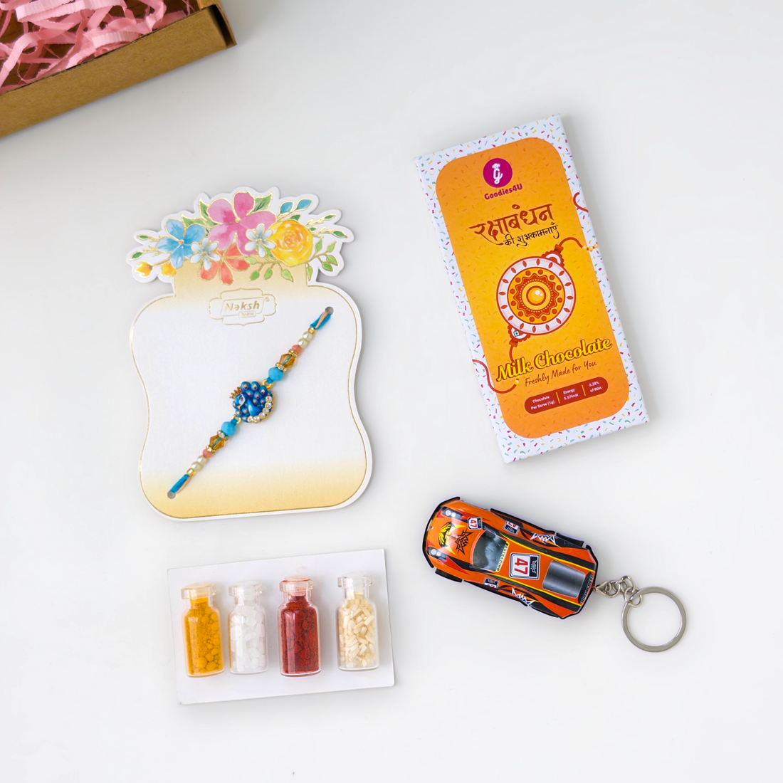 Blue Peacock Rakhi Hamper – From Sister to Brother