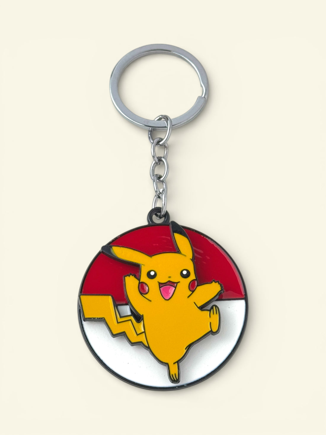 Keychain with Pikachu character on a red and black circle design